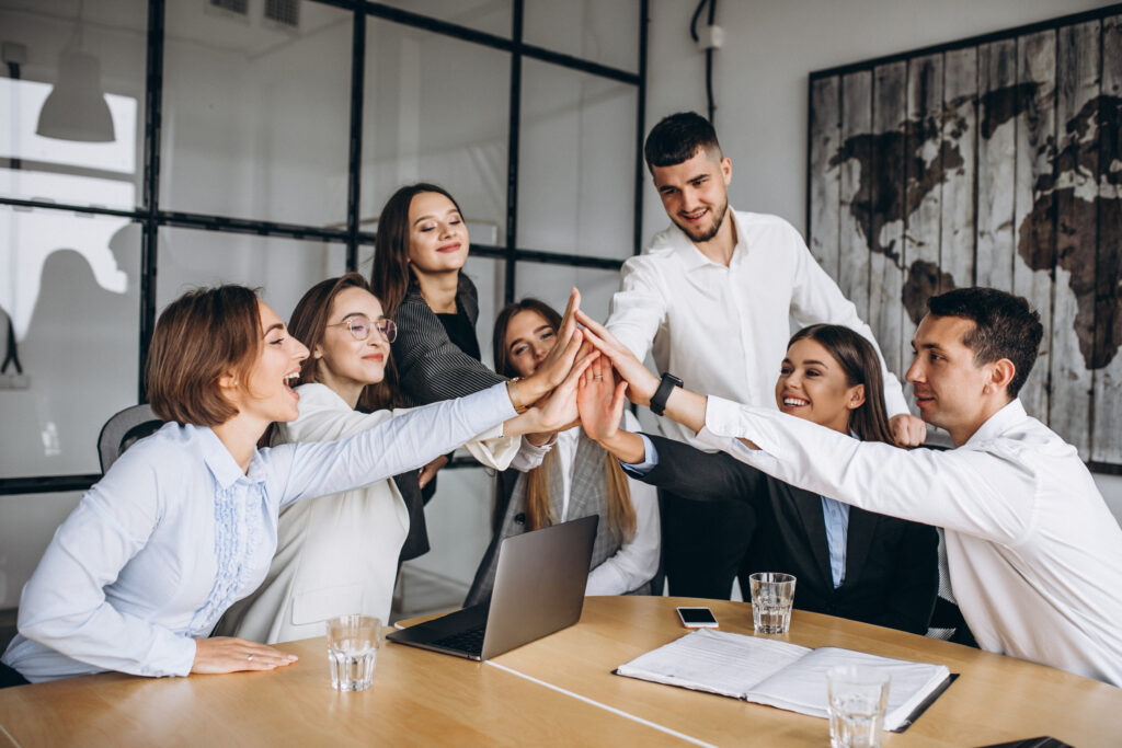 group of people working out business plan in an office
